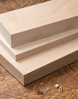 5/4 hard maple lumber stacked