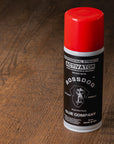 Bossdog activator can on a wooden surface